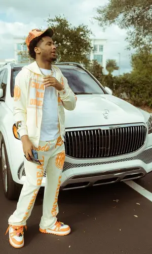 ThatBoyFunny wearing Chasing Real Dreams pants