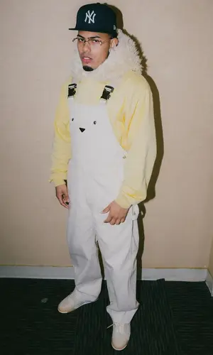 Myke Towers’ Outfit in Prada Suit, Marni Hoodie & New Era Cap (2023)