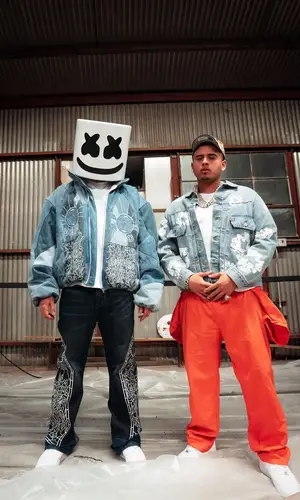 Marshmello’s Outfit in Who Decides War Jacket, Nike Sneakers & Marshmello Merch (2023)
