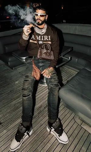 Anuel AA’s Outfit in Amiri Bag & Bottega Veneta Eyewear (2023)
