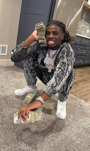 SleazyWorld Go wearing Supreme pants