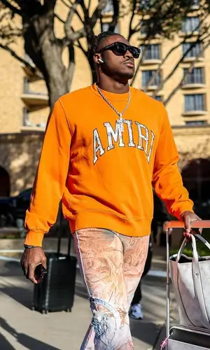 A.J. Brown wearing Amiri sweatshirt