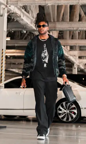 Davante Adams wearing Nike sneakers