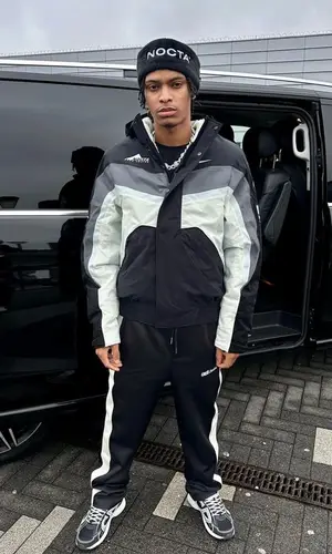 Nemzzz wearing Creo Studios pants