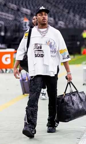 Justin Jefferson wearing Who Decides War pants