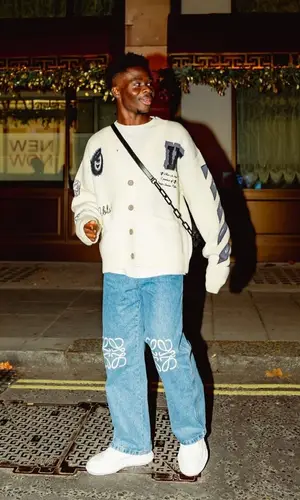 Bukayo Saka wearing Off-White sweater