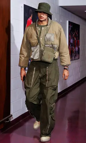 Kyle Kuzma’s Outfit in Enfants Riches Deprimes Jacket, Rick Owens Sneakers & Readymade Hat (2023)