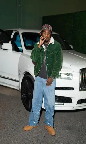 Lil Tjay wearing Kith jacket