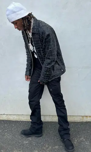 Rich The Kid wearing Chrome Hearts hat