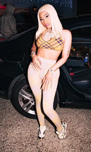 Nicki Minaj’s Outfit in Burberry Top & Bottega Veneta Sneakers (2023)