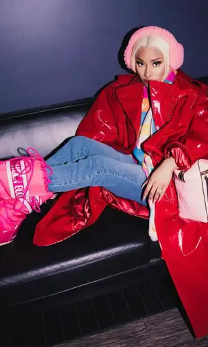 Nicki Minaj’s Outfit in Dolce & Gabbana Jacket, Chanel Bag & Gucci (2023)