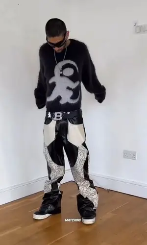 Aly Meghani wearing Maison Bon Voyage pants