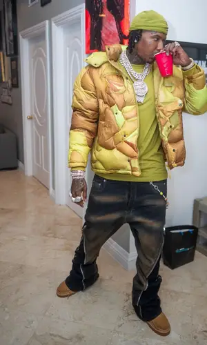 Moneybagg Yo wearing KidSuper jacket