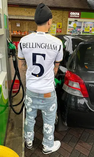 Central Cee wearing Denim Tears jeans