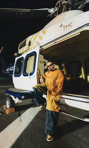 J Balvin’s Outfit in Namesake Jacket, Louis Vuitton Sneakers & Nike (2023)