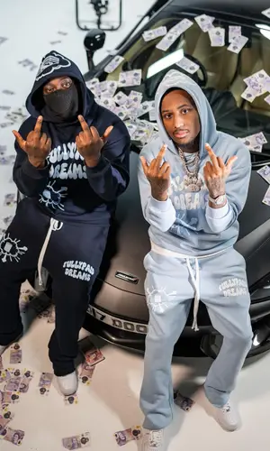 21 Lil Harold wearing Fullypaid pants