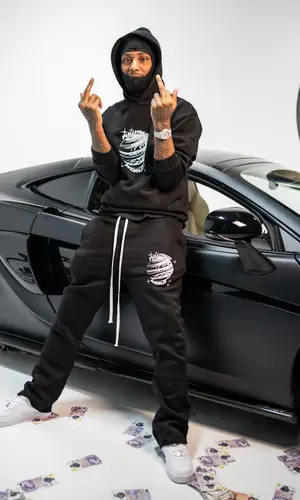 21 Lil Harold wearing Fullypaid pants