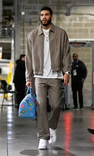 Jayson Tatum’s Outfit in Ami Jacket, Nike Sneakers & Louis Vuitton Bag (2023)