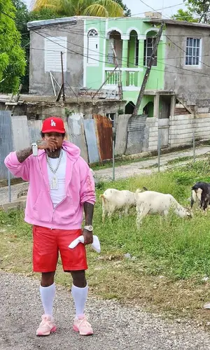 Westside Gunn’s Outfit in Balenciaga Hoodie, New Balance Sneakers & New Era Cap (2023)