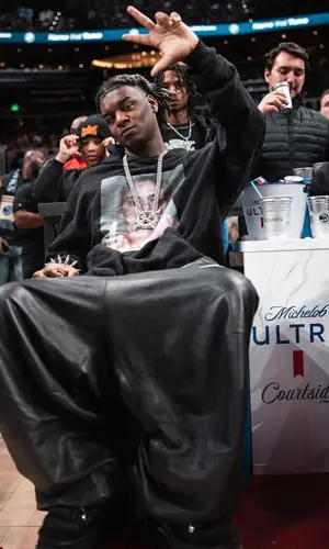Ken Carson wearing Playboi Carti Merch hoody