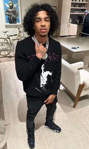 Jay Cinco’s Outfit in REVENGE Sweater, Purple Brand Jeans & Jordan Sneakers (2023)