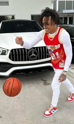 King Cid wearing Amiri jeans