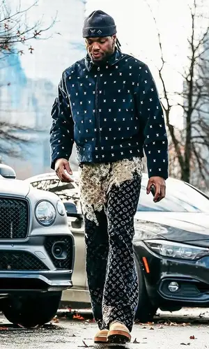 Derrick Henry wearing Louis Vuitton jacket