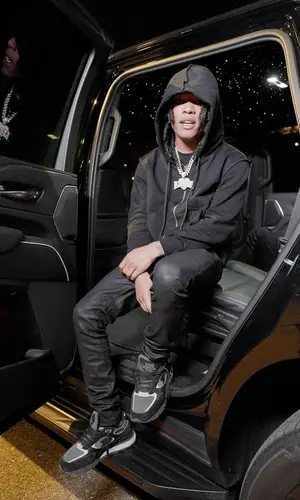 B Lovee’s Outfit in Flaneur Homme Hoodie, Purple Brand Jeans & Louis Vuitton Sneakers (2023)