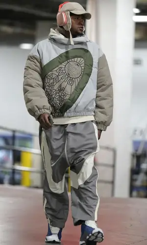 Terry Rozier’s Outfit in Who Decides War Jacket, Jordan Sneakers & Apple (2023)