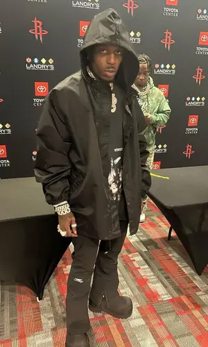 Sauce Walka wearing Balenciaga pants