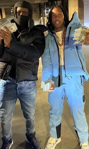 Lil Durk wearing Dior pants
