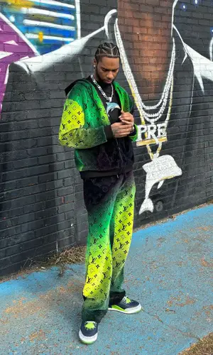 Key Glock wearing Louis Vuitton hoody