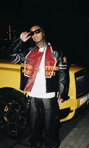 Tyga’s Outfit in Mastermind Jacket, Givenchy Belt & Bottega Veneta Eyewear (2024)