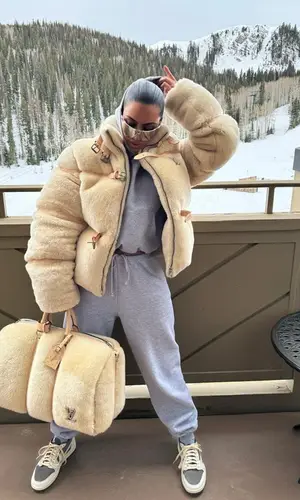 Kim Kardashian’s Outfit in Skims Hoodie, Nike Sneakers & Louis Vuitton Eyewear (2024)