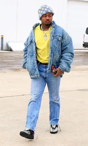 Stefon Diggs’ Outfit in Balenciaga Jacket, Louis Vuitton Hat & Chrome Hearts Wallet (2024)