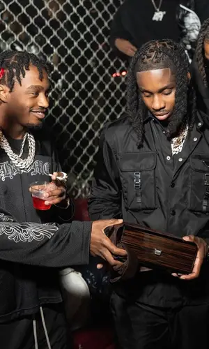 Lil Tjay wearing Chrome Hearts jersey