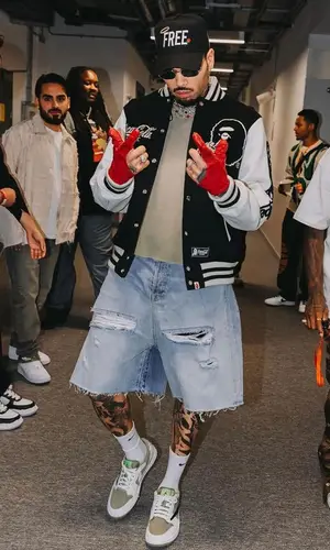 Chris Brown’s Outfit in Bape Jacket, Pheit Cap & Coca-Cola (2024)