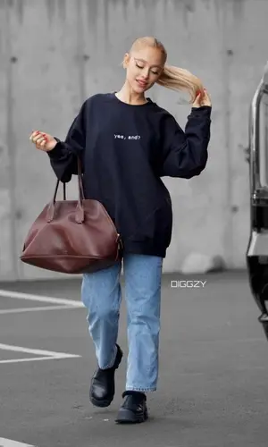 Ariana Grande’s Outfit in Slvrlake Jeans, The Row Bag & Proenza Schouler Sandals (2024)