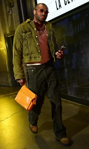 PJ Tucker’s Outfit in Kusikohc Jacket, Givenchy Boots & Goyard Bag (2024)