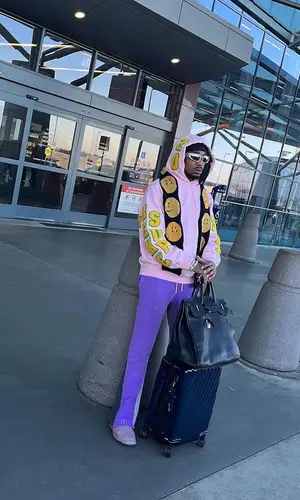 Quavo wearing Supreme hoody