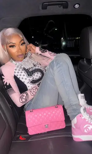 Asian Doll wearing Chanel top