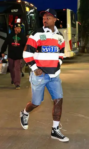 Stefon Diggs’ Outfit in Louis Vuitton Shirt, Converse Sneakers & New Era Cap (2024)