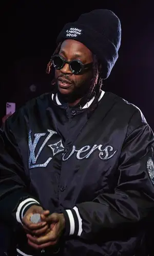2 Chainz’s Outfit in Louis Vuitton Hat (2024)