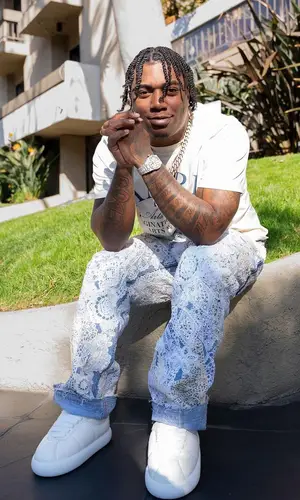 Fredo Bang’s Outfit in Amiri T-Shirt, Earthling VIP Jeans & Marni Sneakers (2024)