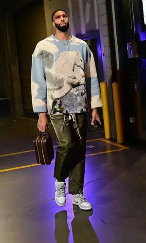 Anthony Davis’ Outfit in Amiri Sweater, Fear of God Trousers & Nike Sneakers (2024)