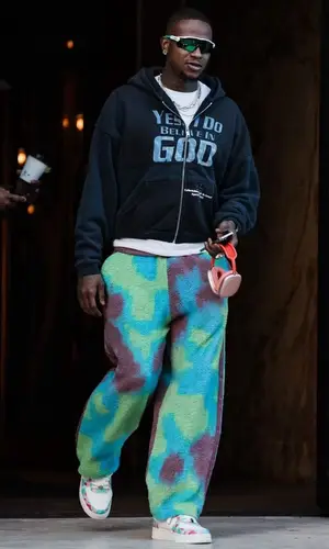 Terry Rozier’s Outfit in Enfants Riches Deprimes Hoodie, Oakley Eyewear & Apple (2024)