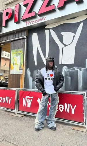 Kai Cenat wearing Chrome Hearts glov