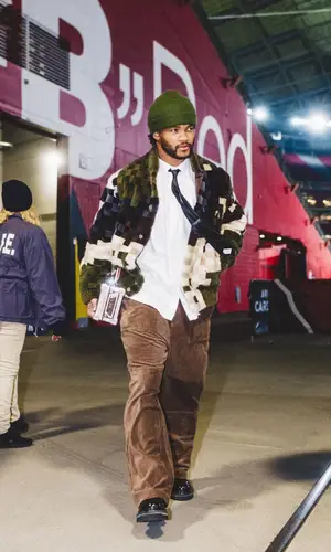 Kyler Murray wearing Louis Vuitton jacket