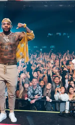 Kevin Gates wearing Burberry shirt