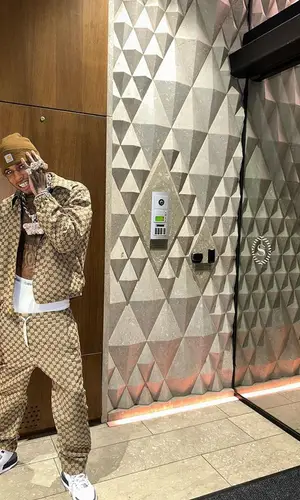NLE Choppa wearing Gucci trousers
